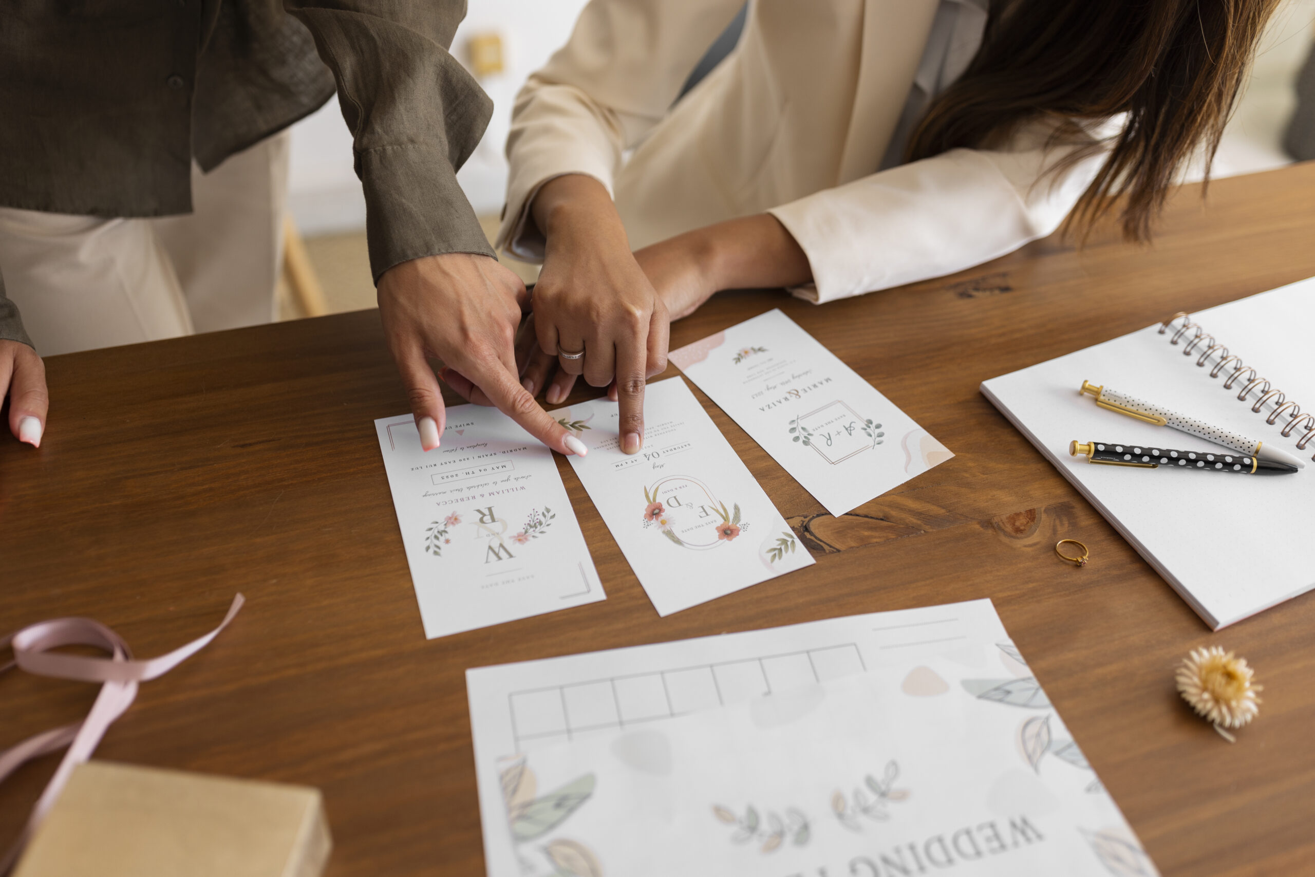 high-angle-women-working-as-wedding-planners